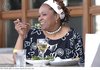 african_woman_eating_salad_in_cafe_dbc01670.jpg