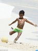 2A0C9F1D00000578-3142991-The_five_year_old_youngster_aims_a_pass_towards_his_father-a-36_1435573.jpg