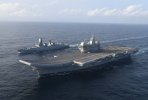 IAC1_Vikrant_with_INS_Kolkata_(D63)_during_sea_trial_(cropped).jpg