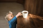little-child-try-grab-cup-600nw-1887544984.jpg
