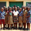 Flux_Dev_A_lively_group_of_Tanzanian_primary_school_students_p_0.jpeg