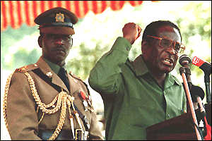 _705510_mugabe_fist300.jpg