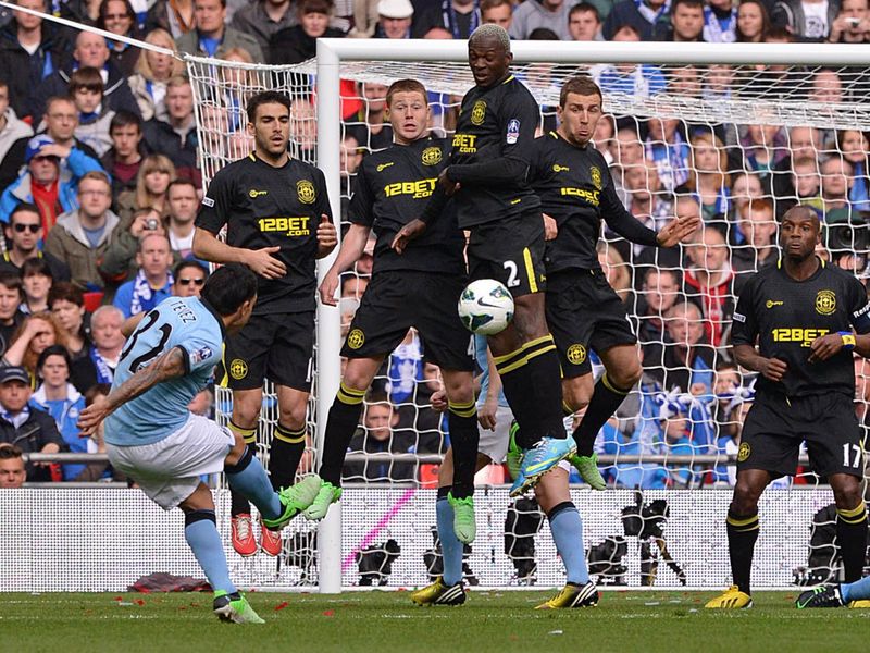 Manchester-City-v-Wigan-Carlos-Tevez-freekic_2942929.jpg