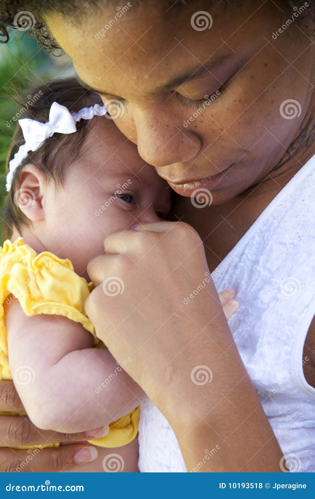 mother-holding-child-10193518.jpg