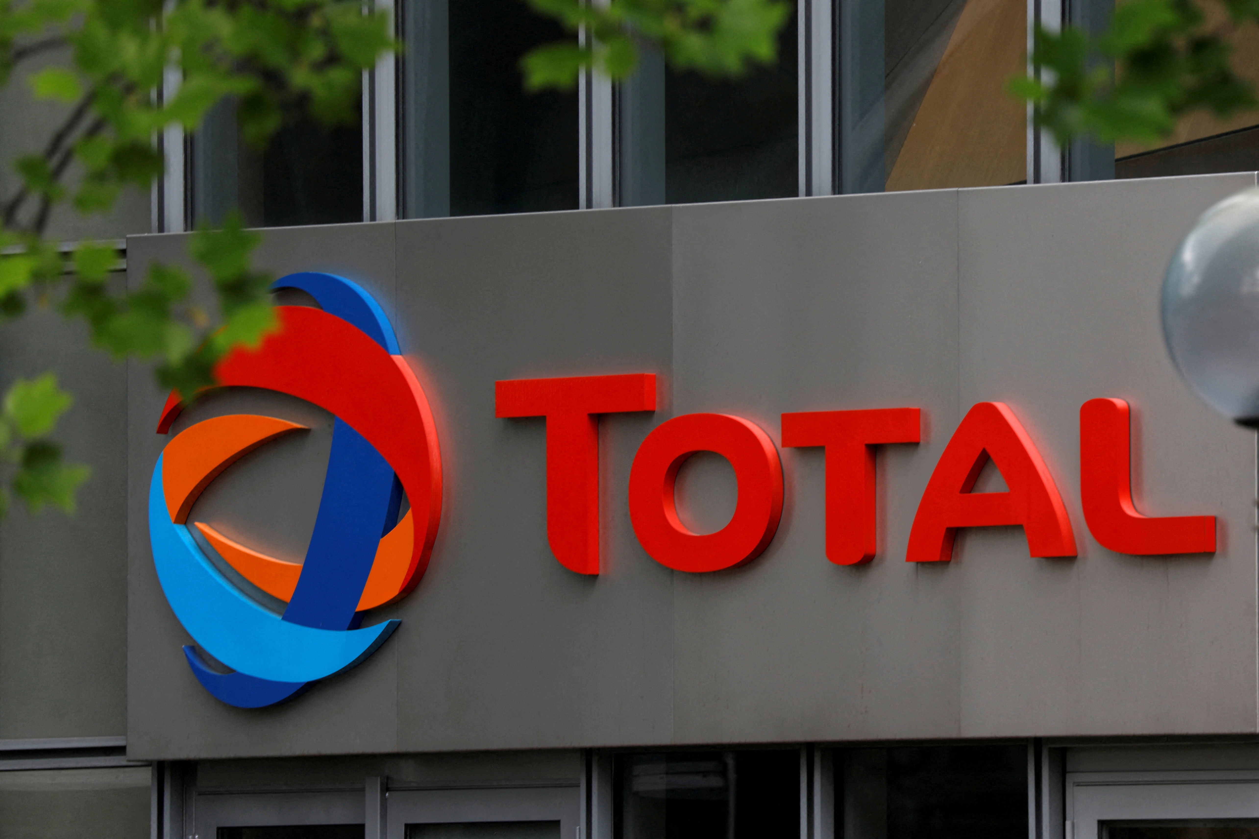 The logo of French oil giant Total is seen at La Defense business and financial district in Courbevoie, near Paris, France. May 16, 2018. REUTERS/Charles Platiau