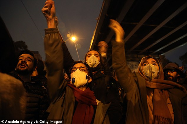 Iranians shout slogans against the government after a vigil held for the victims of the airplane of Ukrainian International Airlines that crashed near Imam Khomeini Airport turned into an anti-government protest outside Amirkabir University in Tehran