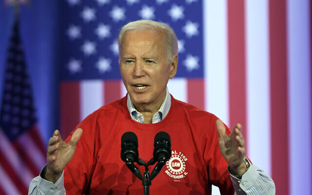 US President Joe Biden speaks to United Auto Workers at the Community Building Complex of Boone County, November 9, 2023, in Belvidere, Illinois.  (AP Photo/Paul Beaty)