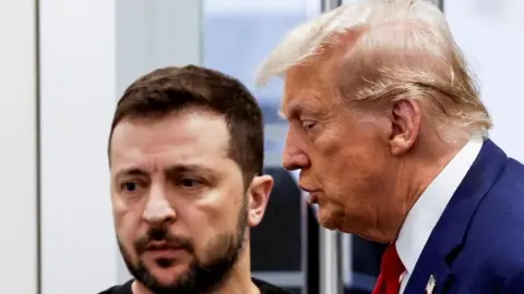 Reuters Donald Trump and Ukraine's President Volodymyr Zelenskiy meet at Trump Tower during the US presidential election campaign in September 2024