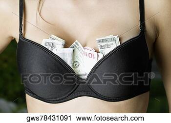 money-tucked-woman_~gws78431091.jpg