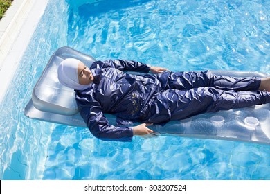 muslim-girl-special-swimming-suit-260nw-303207524.jpg