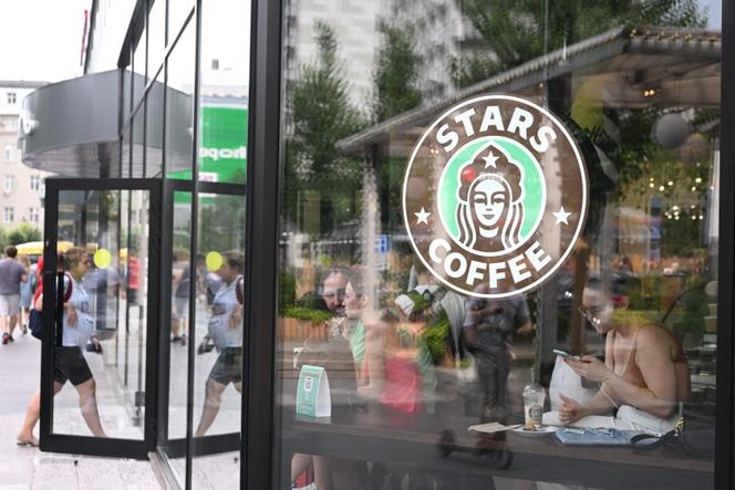 People are seen inside the newly-opened Stars Coffee cafe in Moscow on August 19, 2022.