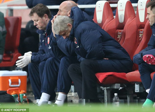 wenger-sitting.jpg
