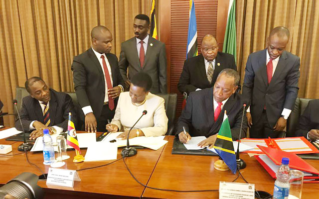 Signing-oil-deal-uganda-and-tanzania.jpg