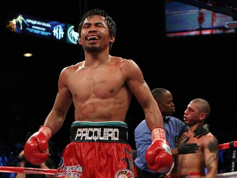 Pacquiao-joy-Cotto-saved_2384914.jpg