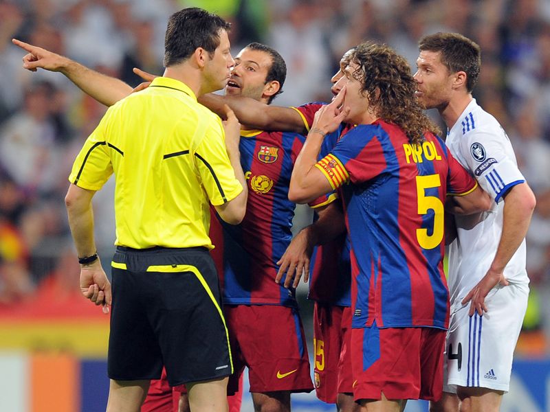 Carles-Puyol-Real-Madrid-Barcelona-Champions-_2590410.jpg